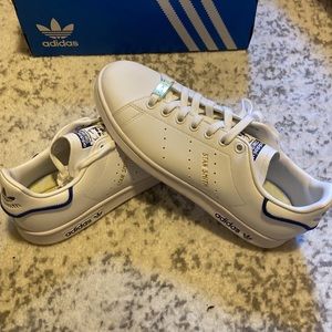 Brand new, never wore Blue Stan Smiths. Size 7.5M / 9F